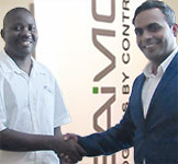 Committee member Lucky Penduka (left) thanks Keegan Moodley for his sponsorship and presentation.